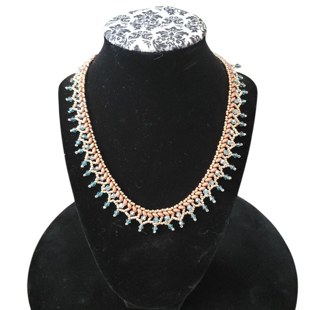 Artisan handmade netted bib necklace with blue & gold seed beads.